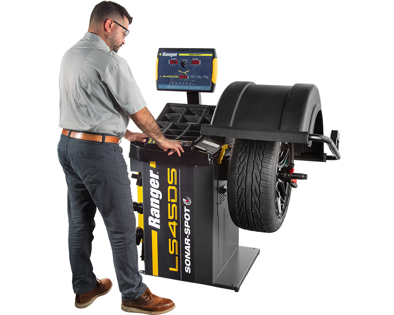 LS45DS Wheel Balancer with operator